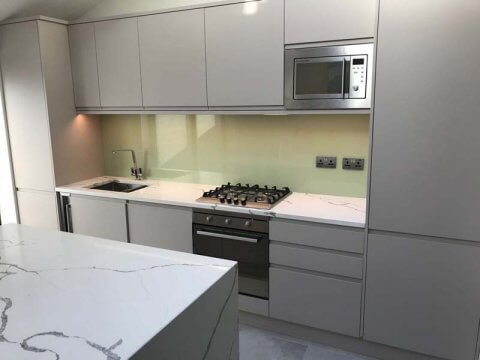 glass backsplash in kitchen